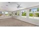 Bright sunroom with multiple windows and ceiling fan at 930 Leisure World --, Mesa, AZ 85206