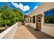 Home's exterior with tile patio and landscaping at 930 Leisure World --, Mesa, AZ 85206