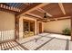 Covered patio with pergola, tile flooring, and access from the house at 930 Leisure World --, Mesa, AZ 85206