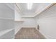 Large walk-in closet with double hanging rods and shelving at 930 Leisure World --, Mesa, AZ 85206