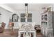 Farmhouse-style dining room with wooden table and hutch at 4110 W Desert Ln, Laveen, AZ 85339