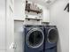 Laundry room with modern washer and dryer at 4110 W Desert Ln, Laveen, AZ 85339