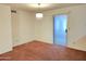 Dining area with sliding glass door and neutral carpeting at 7857 E Flossmoor Ave, Mesa, AZ 85208