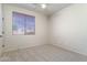 Spacious bedroom with neutral walls, carpet, and a window at 7855 E Kramer St, Mesa, AZ 85207