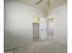Well-lit bedroom with neutral walls, carpet, and a large closet at 7855 E Kramer St, Mesa, AZ 85207