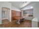 Dining area with a rustic wood table and built-in wooden cabinetry at 7855 E Kramer St, Mesa, AZ 85207