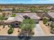 Aerial view of single-story house with desert landscaping and mountain views at 7855 E Kramer St, Mesa, AZ 85207