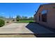 Spacious side yard with concrete patio and gated access at 7855 E Kramer St, Mesa, AZ 85207