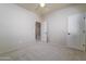 Simple bedroom with carpet flooring and neutral walls at 7855 E Kramer St, Mesa, AZ 85207