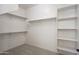 Large walk-in closet with shelving and hanging rods at 7855 E Kramer St, Mesa, AZ 85207