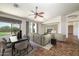 Bright dining area with a view of the backyard and adjacent living room at 7855 E Kramer St, Mesa, AZ 85207