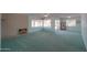 Spacious living room with fireplace and water view at 4906 E Lake Point Cir, Phoenix, AZ 85044