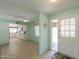 Light and airy entryway with view into kitchen at 4906 E Lake Point Cir, Phoenix, AZ 85044