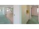 Hallway with view into kitchen and bedroom at 4906 E Lake Point Cir, Phoenix, AZ 85044