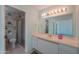 Bright bathroom with vanity, shower, and toilet at 4906 E Lake Point Cir, Phoenix, AZ 85044