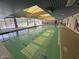 Indoor swimming pool at Ahwatukie Recreation Center with large windows and skylights at 4906 E Lake Point Cir, Phoenix, AZ 85044