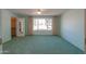 Bedroom with large window and walk-in closet at 4906 E Lake Point Cir, Phoenix, AZ 85044