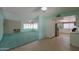 Open kitchen with stainless steel appliances and white cabinets at 4906 E Lake Point Cir, Phoenix, AZ 85044