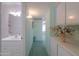 Hallway with bathroom and built-in storage at 4906 E Lake Point Cir, Phoenix, AZ 85044