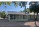 Home with a screened patio and a gravel backyard at 4906 E Lake Point Cir, Phoenix, AZ 85044
