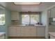 Kitchen with double sink and water views at 4906 E Lake Point Cir, Phoenix, AZ 85044