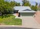 Front view of a single-story home with a two-car garage at 4906 E Lake Point Cir, Phoenix, AZ 85044