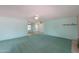 Bright living room features light walls, carpet, and a fireplace at 4906 E Lake Point Cir, Phoenix, AZ 85044