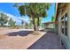 Home exterior with a backyard patio and lake view at 4906 E Lake Point Cir, Phoenix, AZ 85044