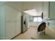 Well-equipped kitchen with white cabinets and tiled floor at 4906 E Lake Point Cir, Phoenix, AZ 85044