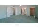Bedroom with access to bathroom and large closet at 4906 E Lake Point Cir, Phoenix, AZ 85044