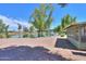 Backyard patio with lake view and screened enclosure at 4906 E Lake Point Cir, Phoenix, AZ 85044