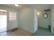 Inviting entryway with tiled floors and a white door at 4906 E Lake Point Cir, Phoenix, AZ 85044