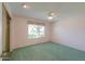 Light and airy bedroom with window and carpet at 4906 E Lake Point Cir, Phoenix, AZ 85044