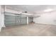 Two-car garage with overhead storage and epoxy flooring at 219 E Palomino Ct, Gilbert, AZ 85296