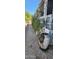 Landscaped side yard with decorative fountain at 2233 E Behrend Dr # 41, Phoenix, AZ 85024