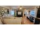 Living room featuring hardwood floors and built-in shelving at 2233 E Behrend Dr # 41, Phoenix, AZ 85024