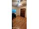 Spacious bedroom with laminate flooring and a ceiling fan at 2233 E Behrend Dr # 41, Phoenix, AZ 85024