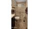 Full bathroom with shower, toilet and linen storage at 2233 E Behrend Dr # 41, Phoenix, AZ 85024