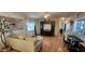Living room with hardwood floors, a sofa, and a home office at 2233 E Behrend Dr # 41, Phoenix, AZ 85024