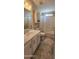 Clean bathroom with bathtub, shower, and updated vanity at 2233 E Behrend Dr # 41, Phoenix, AZ 85024