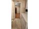 Laundry room with washer, dryer, and built-in shelving at 2233 E Behrend Dr # 41, Phoenix, AZ 85024