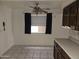 Cozy kitchen nook with wood cabinets and a window at 3345 E University Dr # 25, Mesa, AZ 85213