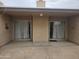 Covered patio with sliding glass doors and concrete flooring at 3345 E University Dr # 25, Mesa, AZ 85213