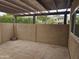 Private patio with wall and partial view of surrounding buildings at 3345 E University Dr # 25, Mesa, AZ 85213