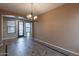 Bright dining area with tile floors and a chandelier at 32121 N Chestnut Trl, San Tan Valley, AZ 85143