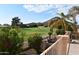 Elevated view of lush golf course and desert mountain at 21956 N 59Th Ln, Glendale, AZ 85310