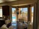 Breakfast nook with pool view and custom window treatments at 21956 N 59Th Ln, Glendale, AZ 85310