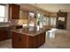 Spacious kitchen with island, stainless steel appliances, and granite countertops at 21956 N 59Th Ln, Glendale, AZ 85310