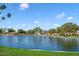 Community lake with fountain and lush landscaping at 19667 N Marquez Cir, Maricopa, AZ 85138