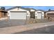 New construction home with two-car garage and paved driveway at 5816 E Montara Pl, Mesa, AZ 85215